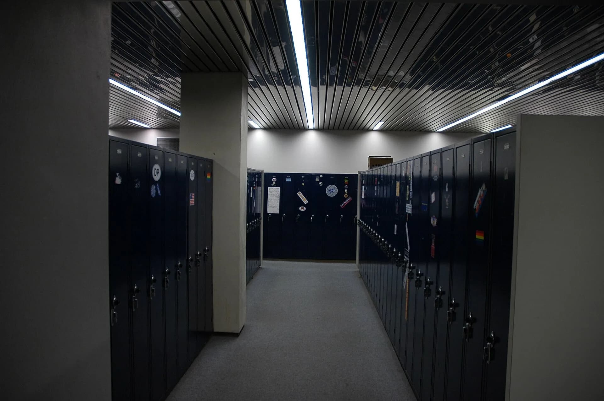 Rows of metal lockers in a room