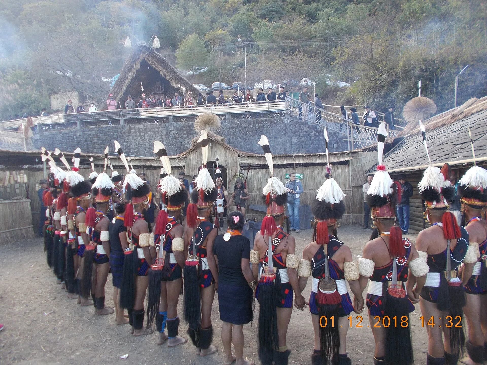 Naga dancers in traditional dress performing at the Hornbill Festival