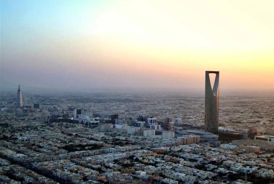 The Riyadh skyline at sunset with the Kingdom Centre tower