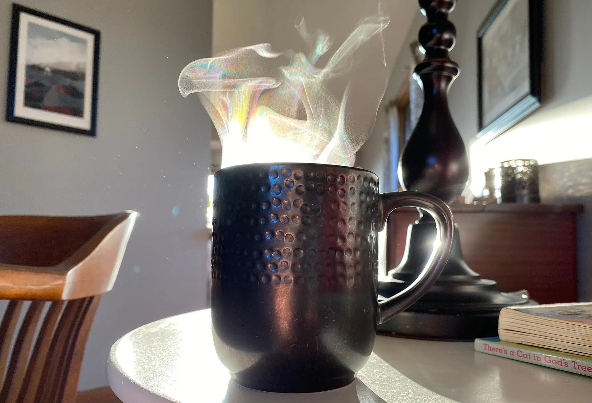 A steaming mug of coffee on a table