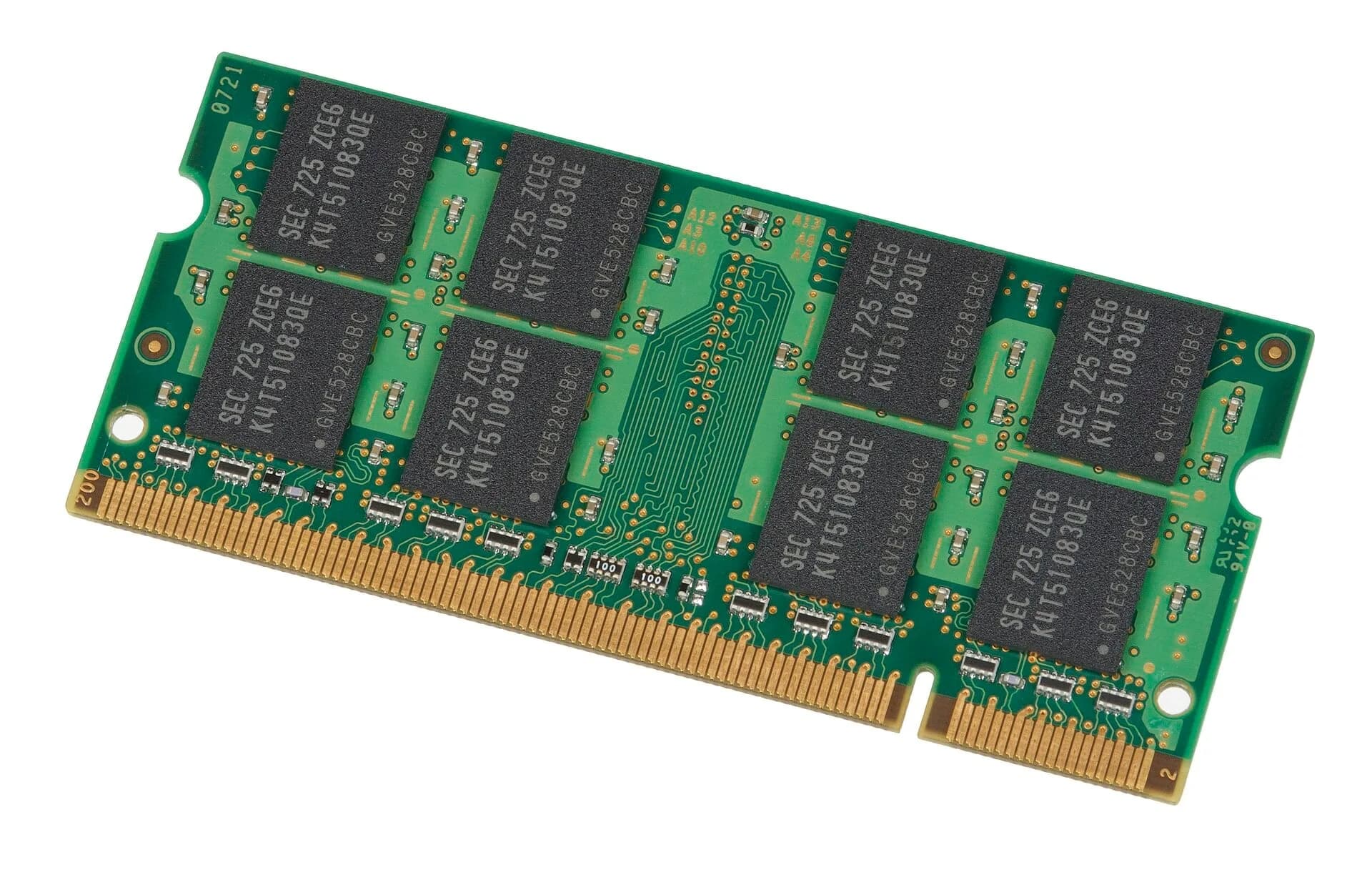 A laptop memory (RAM) module with black chips on a green circuit board