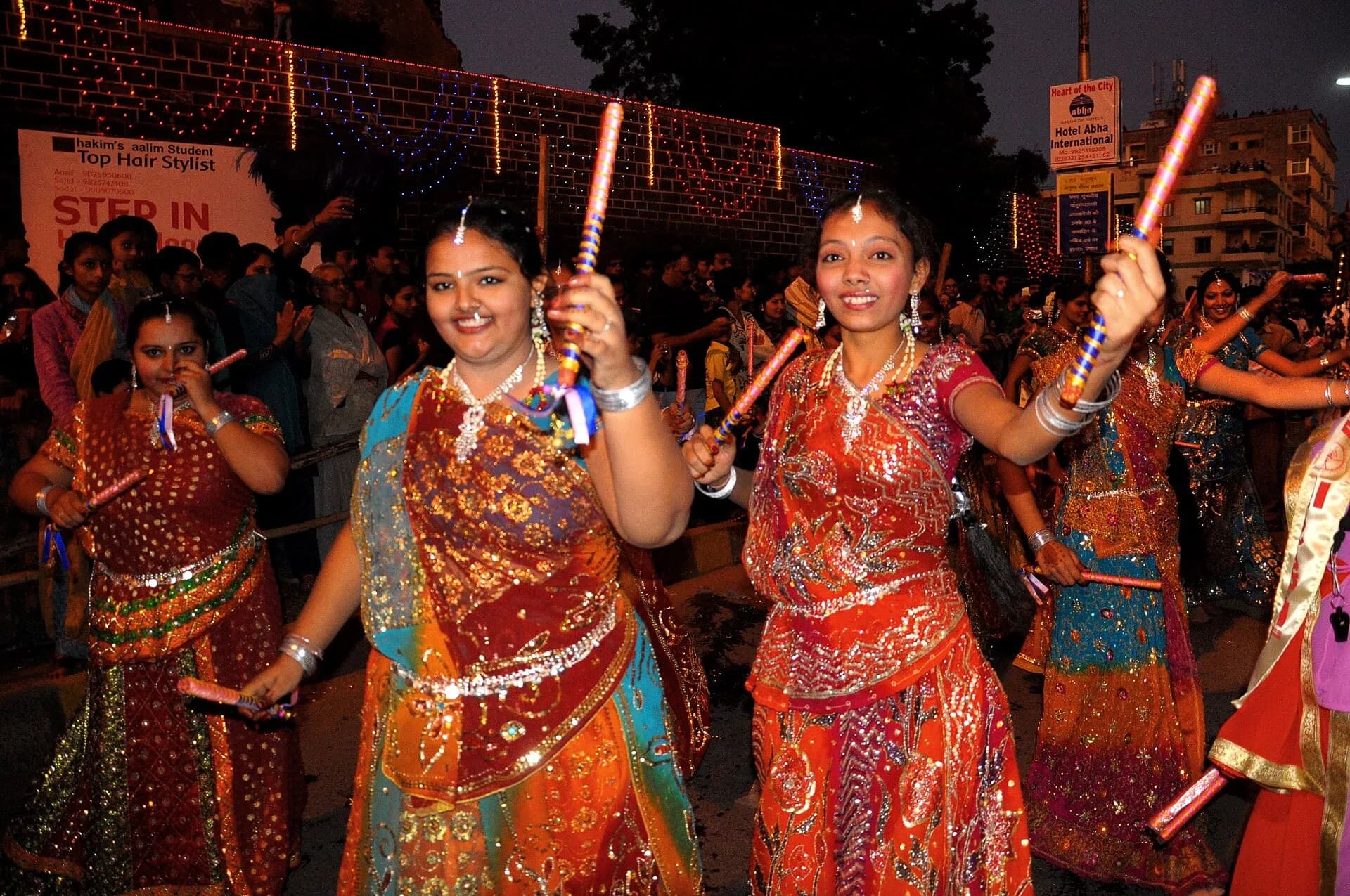 Dancers in colourful traditional dress performing garba in Gujarat