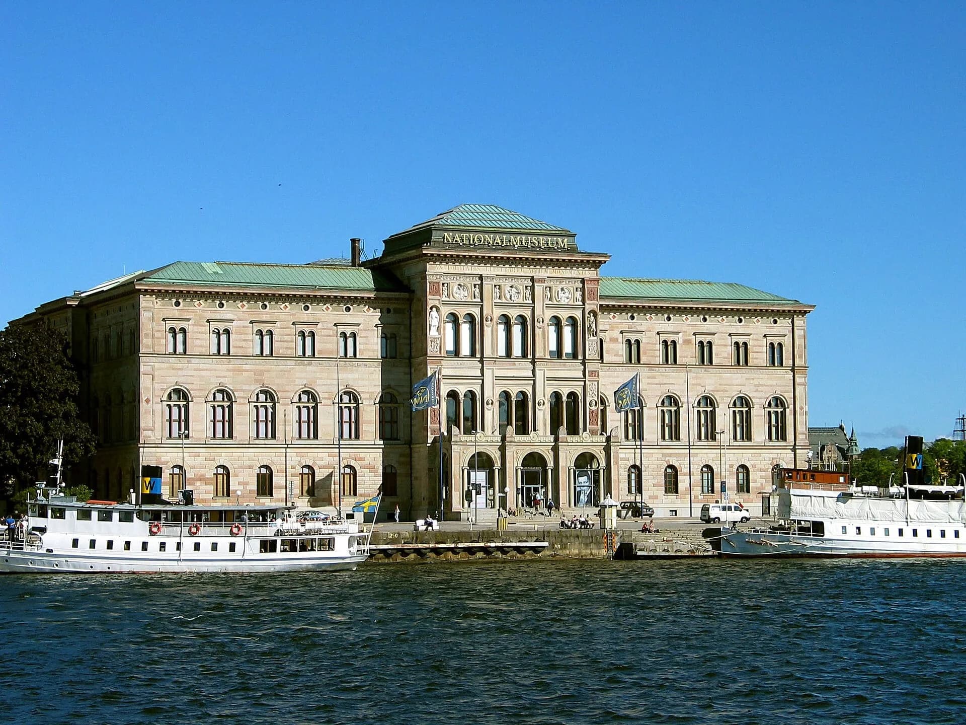 A grand stone building on the waterfront in Stockholm