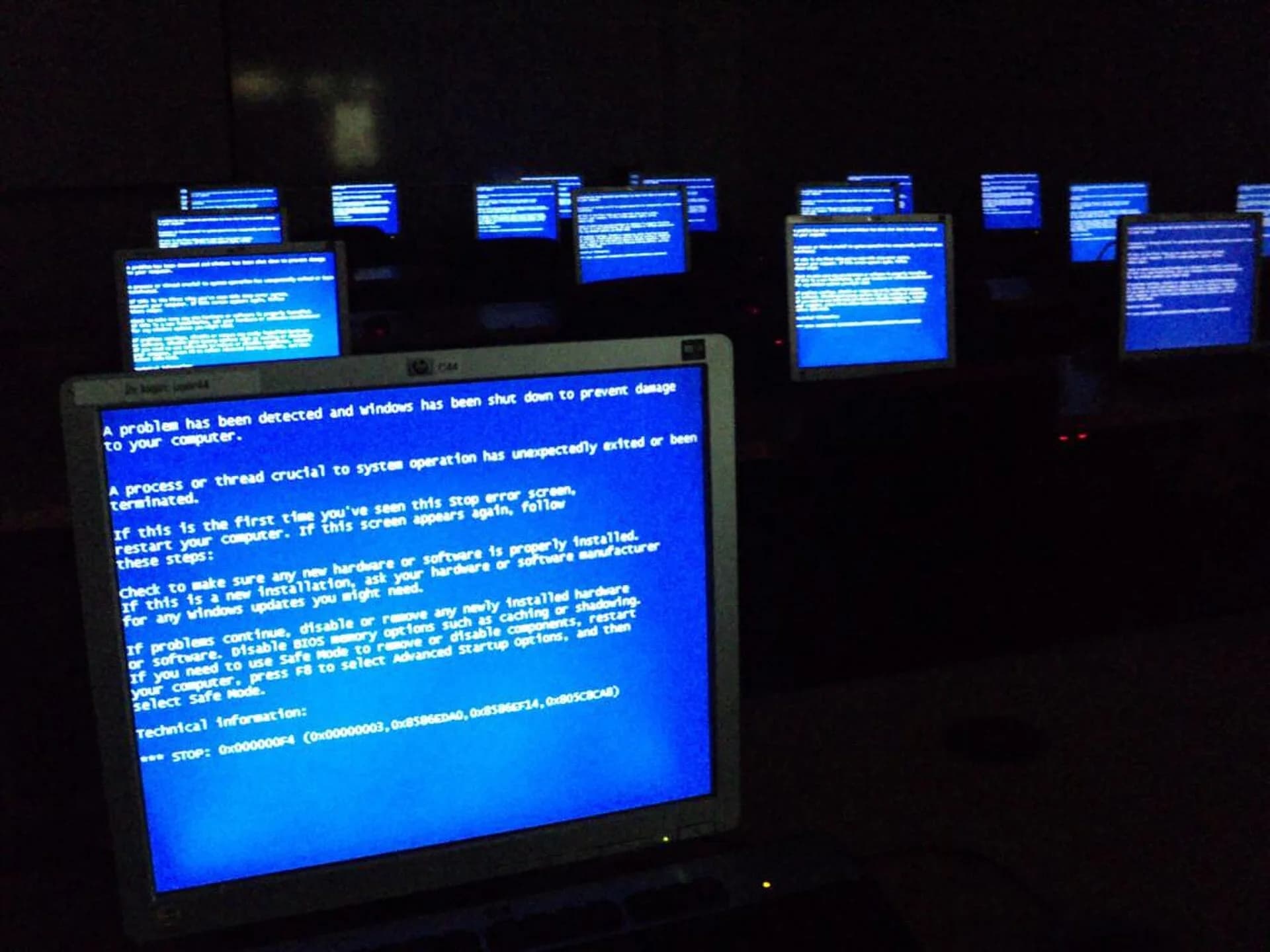 A room of computers all showing the same error message