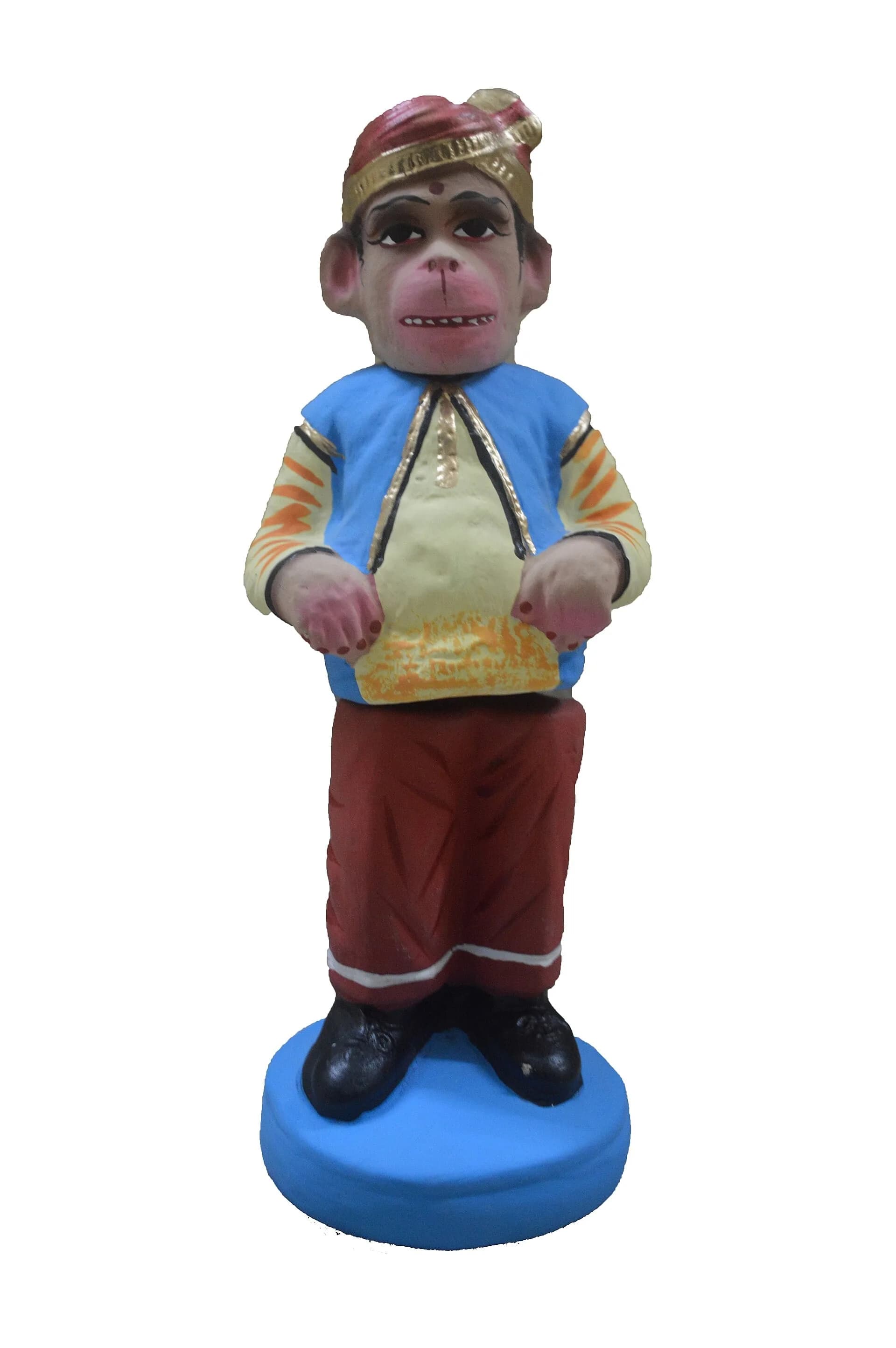 A painted clay doll of the kind displayed in Golu