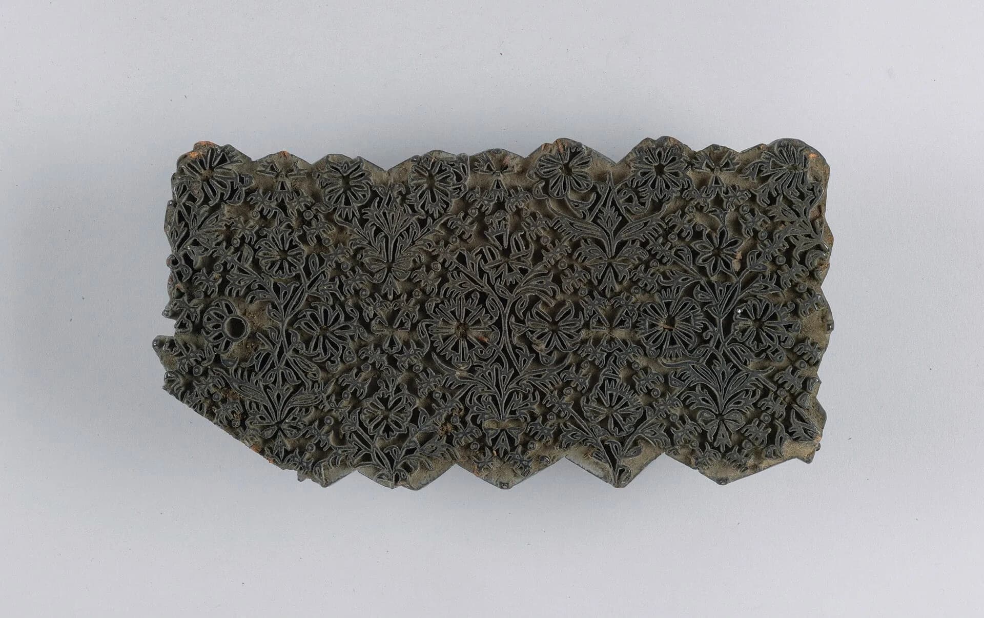 A carved wooden block used for printing textiles