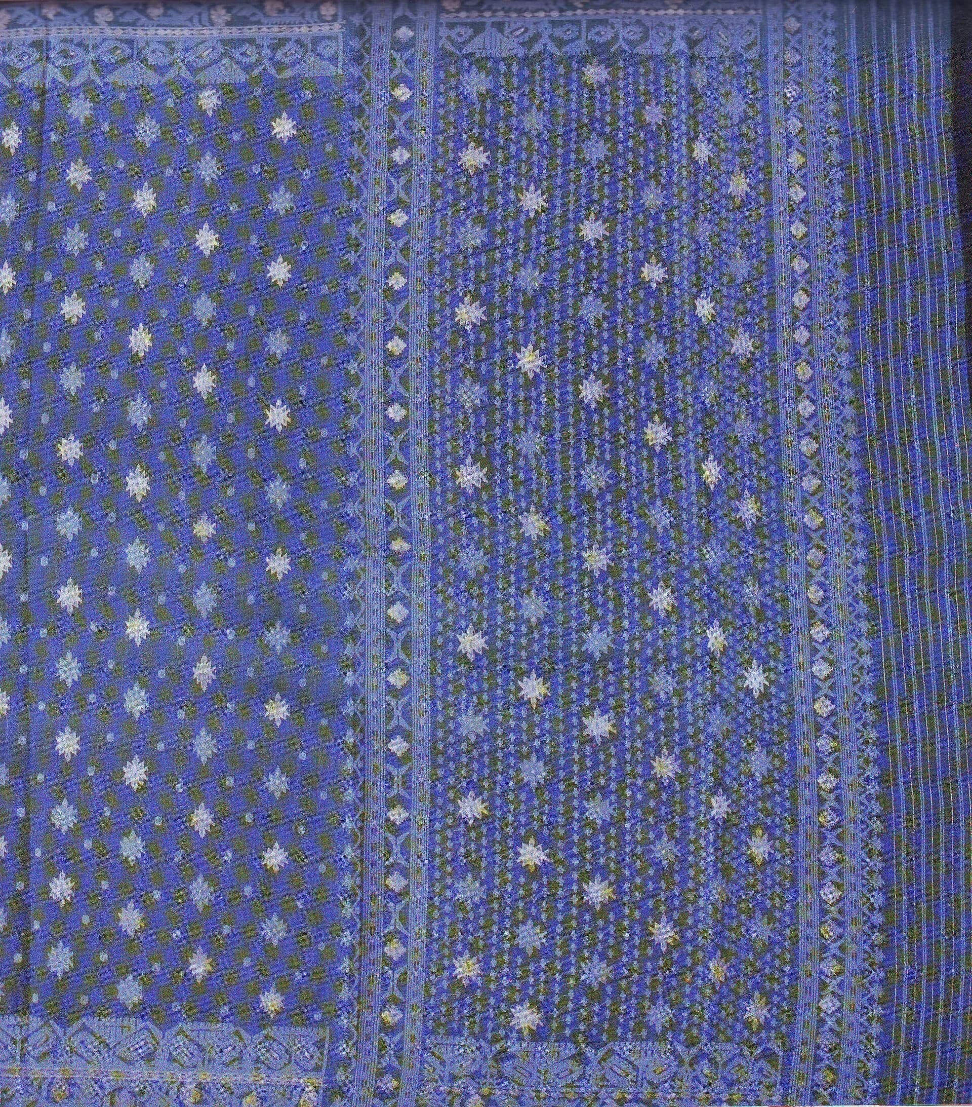 A blue Jamdani sari with woven white motifs