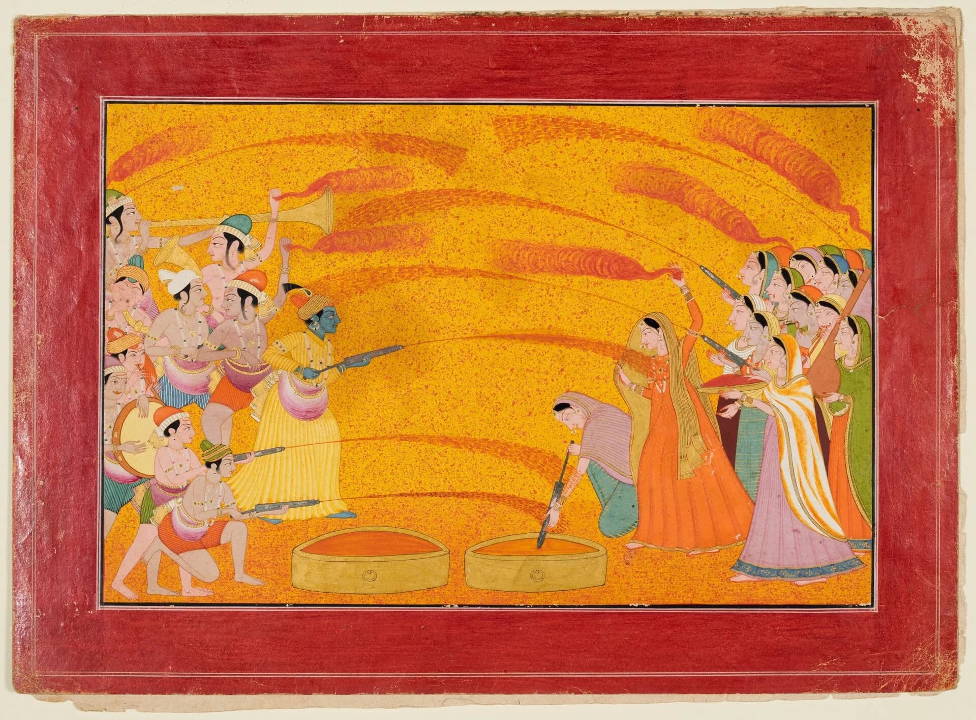 A Pahari painting from Guler of Krishna celebrating Holi