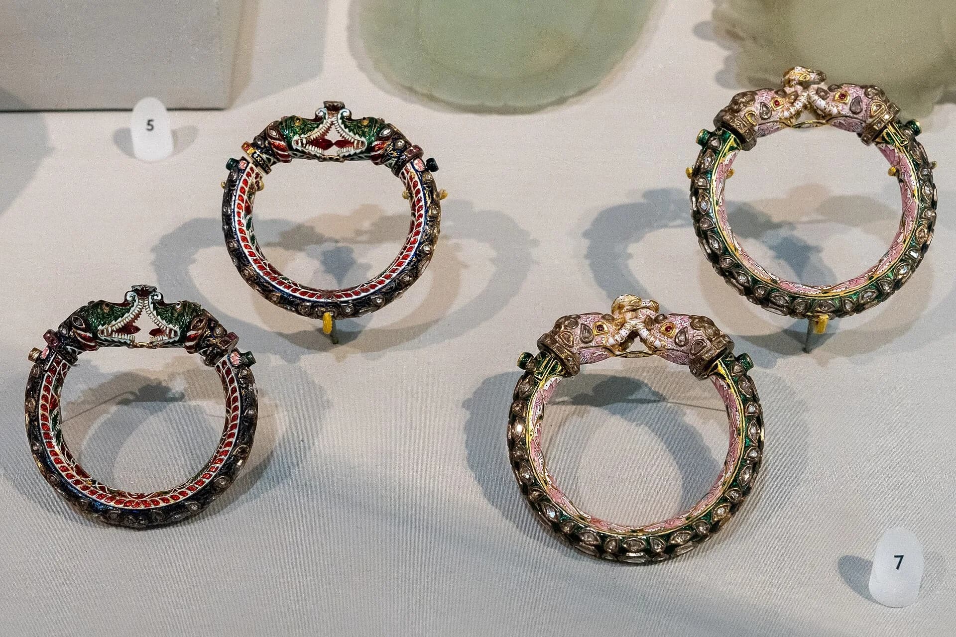 Gold bangles with makara and elephant-head ends in a museum display