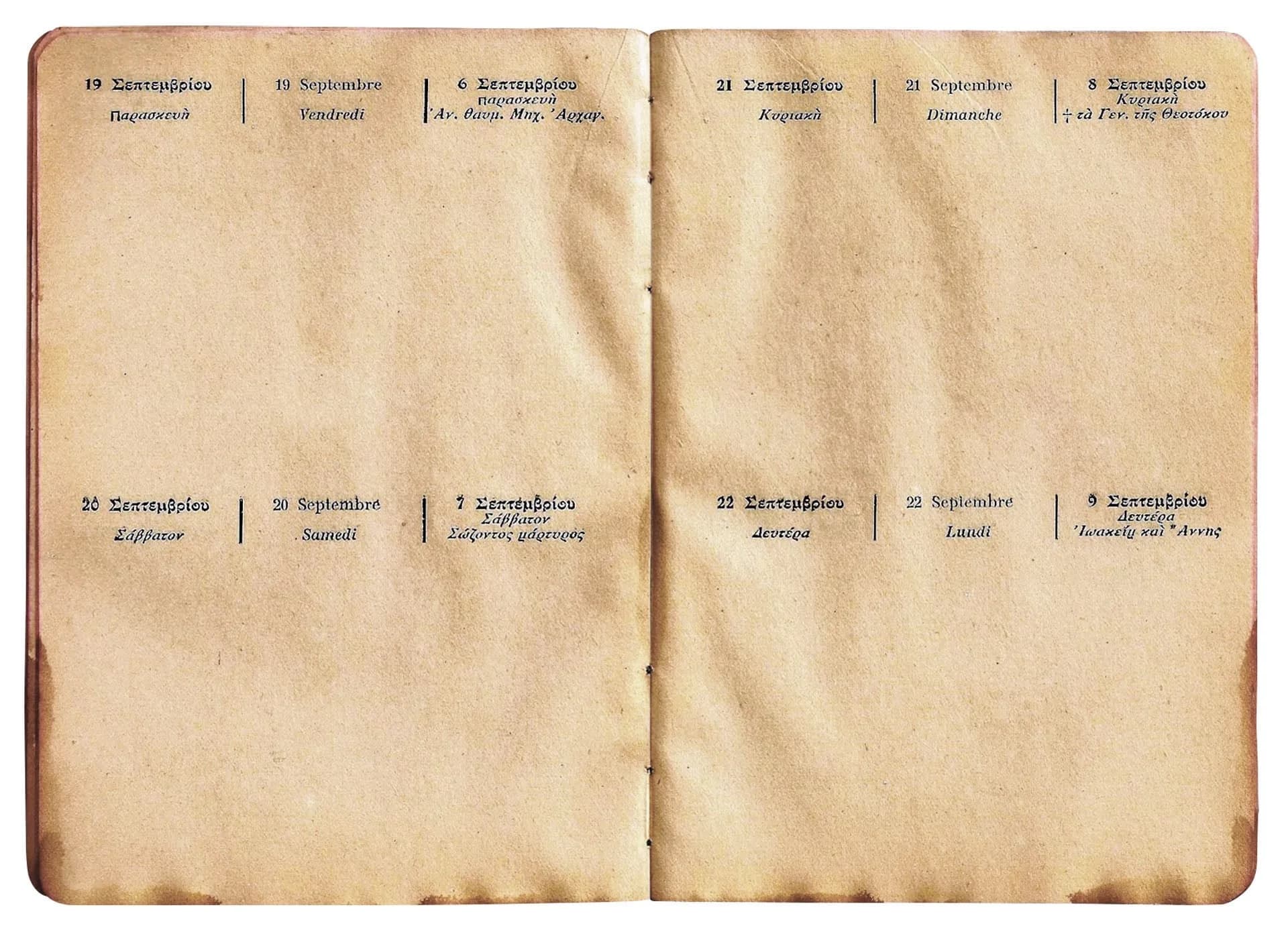 An old printed calendar showing two calendar systems side by side