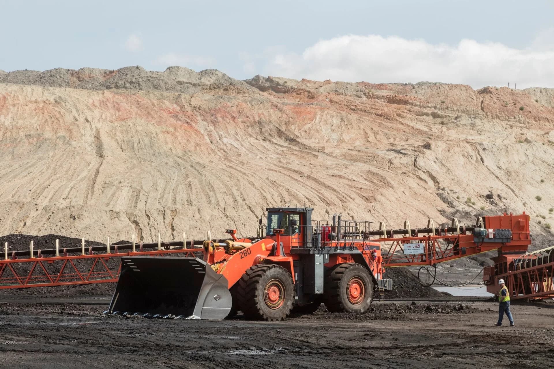 Heavy machinery working in an open-pit mine