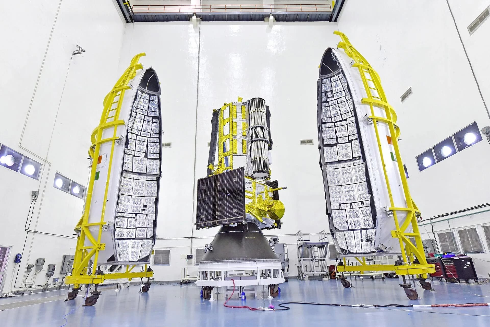 The NISAR satellite encapsulated in a payload fairing at an ISRO launch site