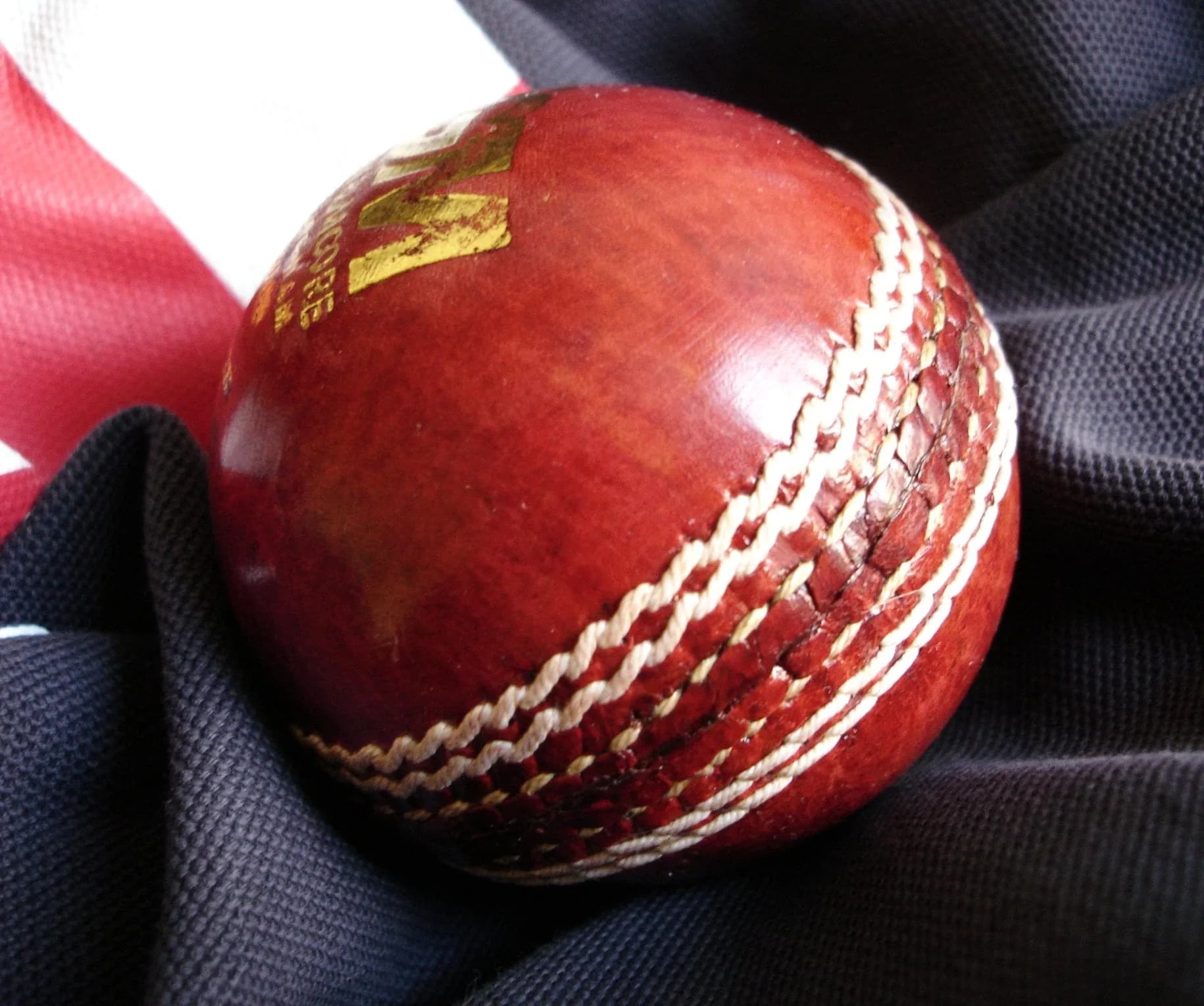 A red cricket ball