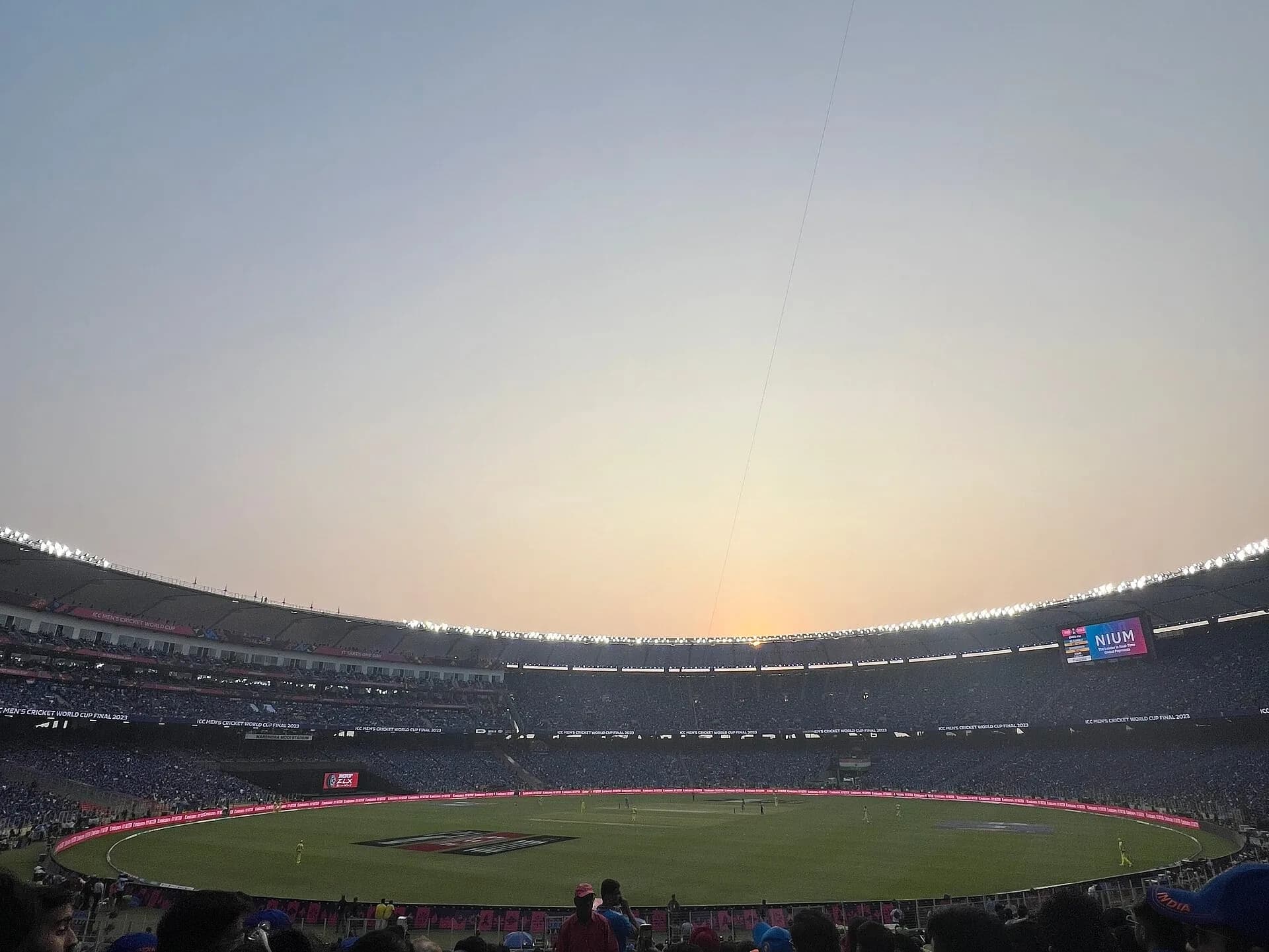 A cricket stadium at sunset