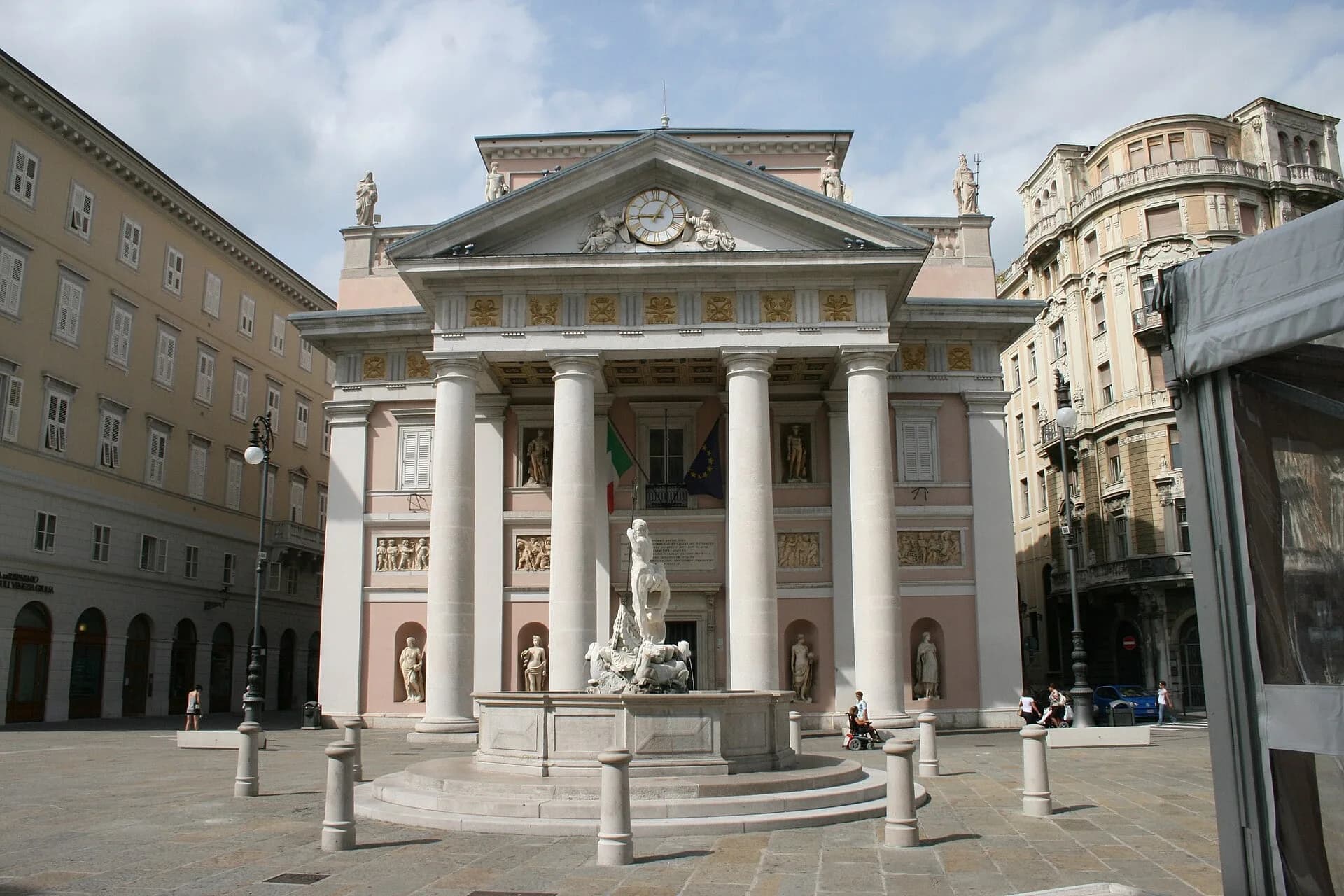A neoclassical stock exchange building on a city square