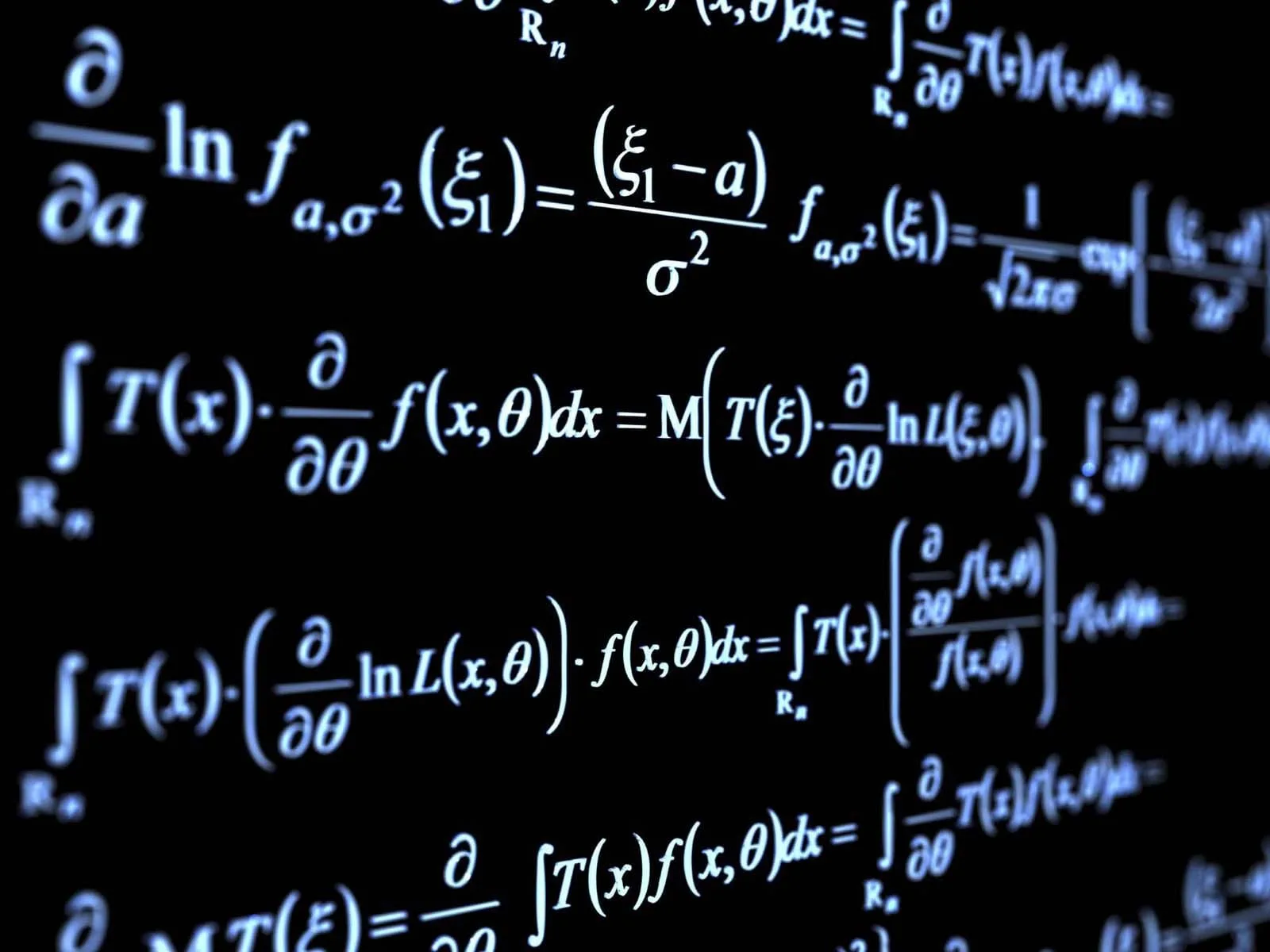Mathematical formulae written in white on a dark blackboard
