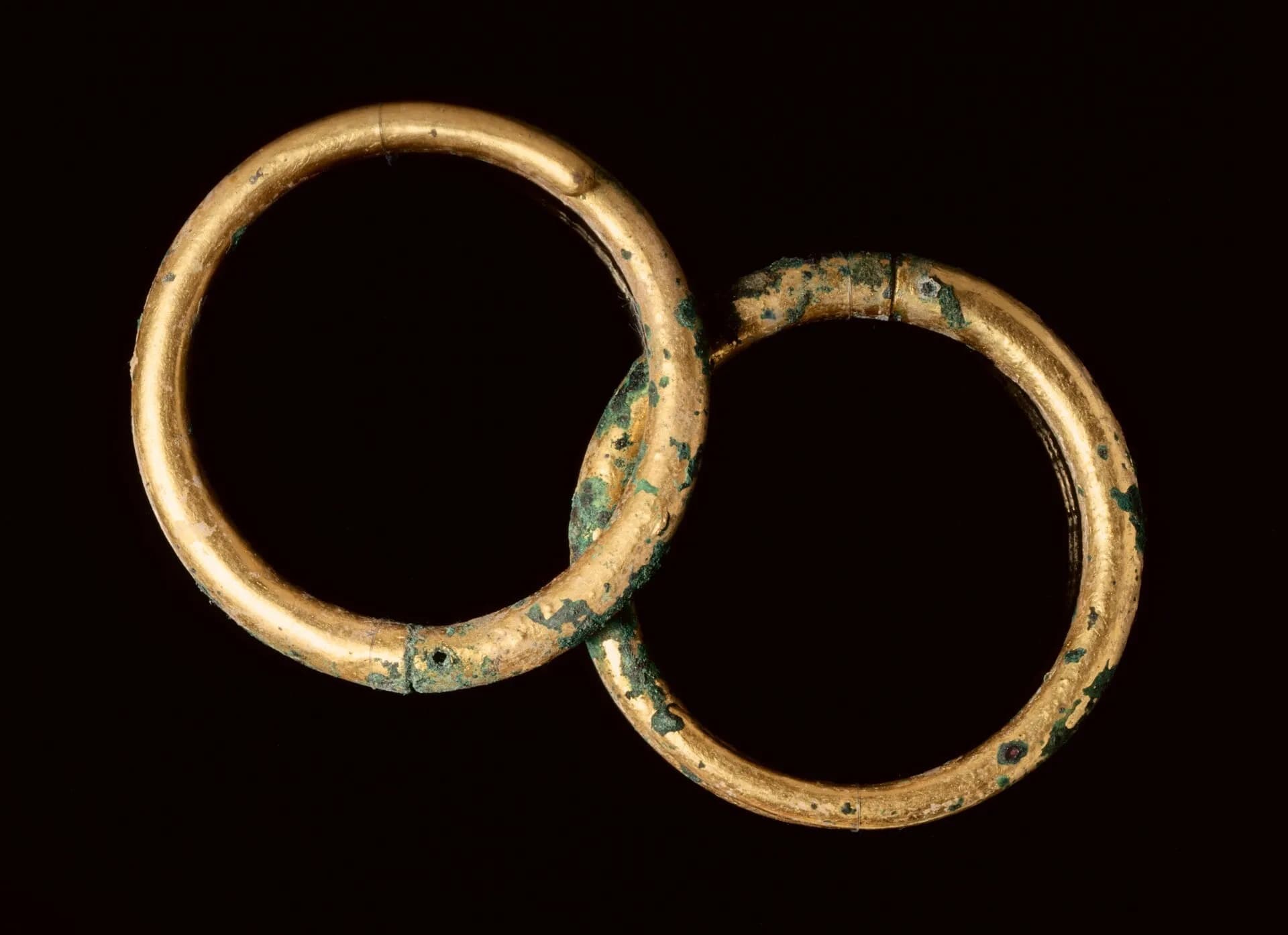 A pair of gold bangles