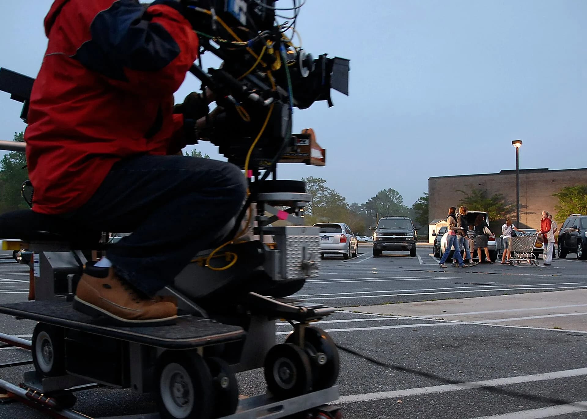 A film camera operator at work on a set