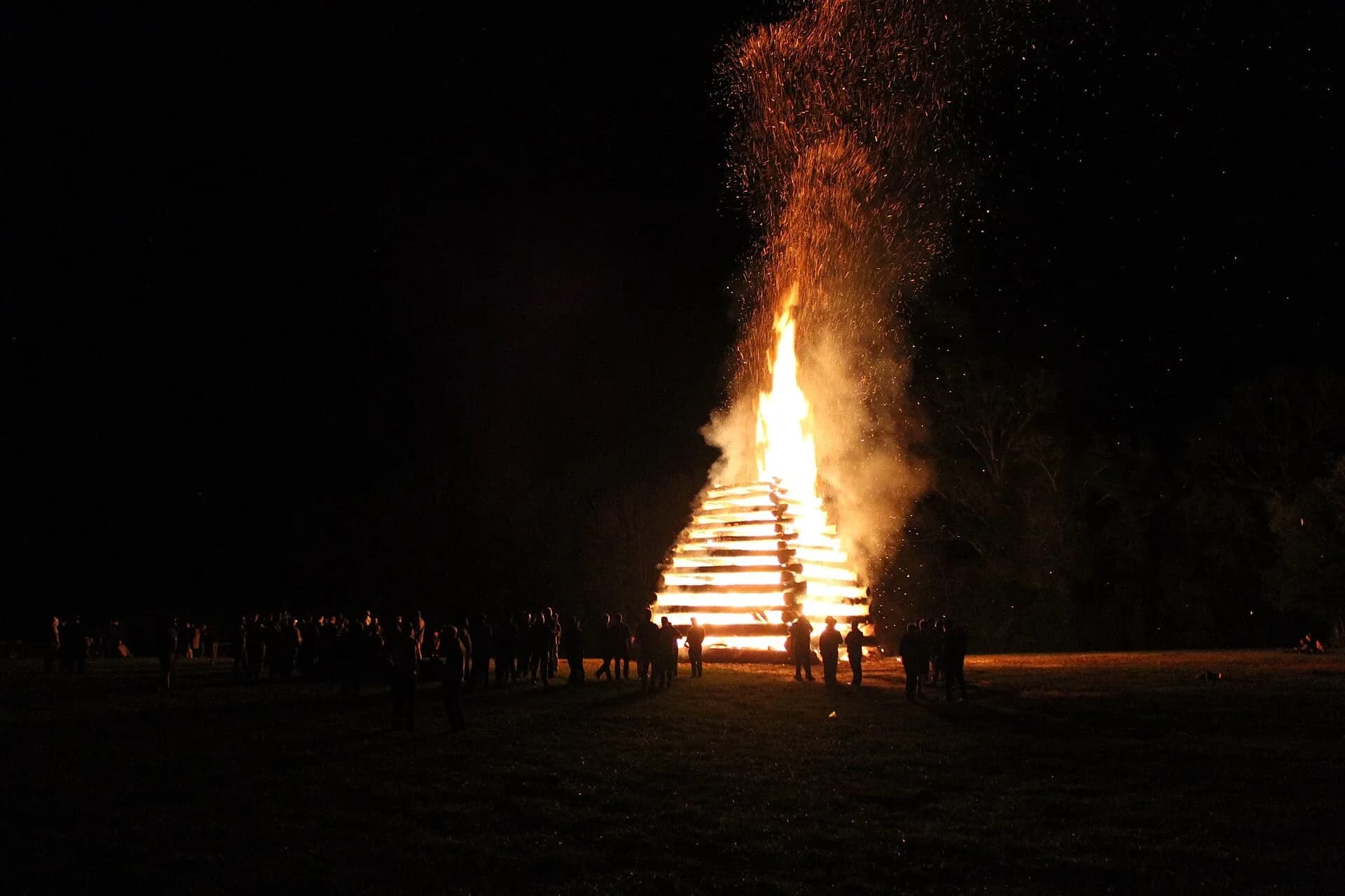 A large bonfire burning at night