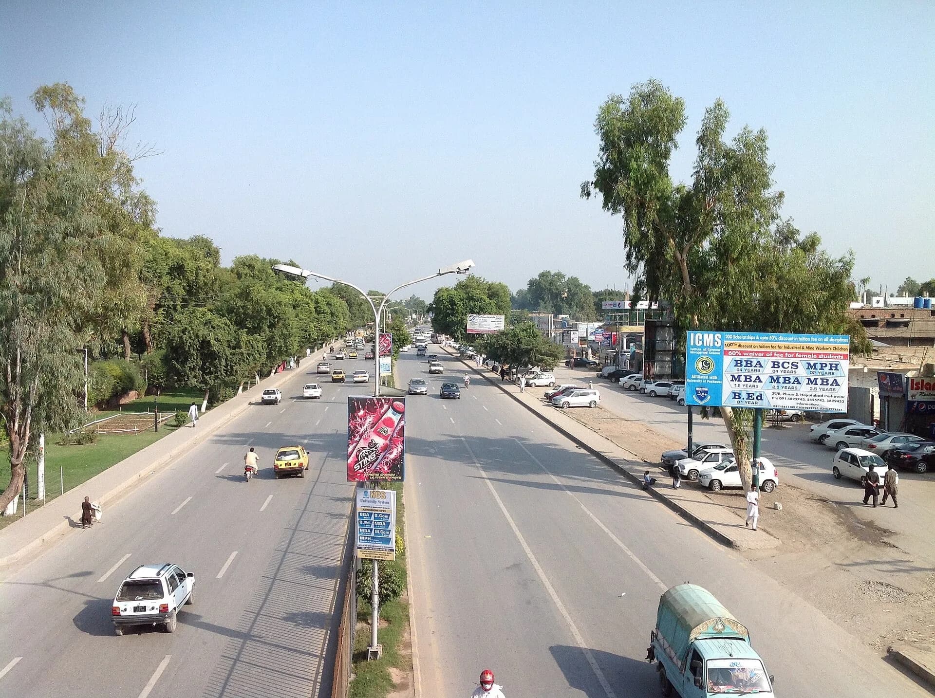 A wide road through the city of Peshawar