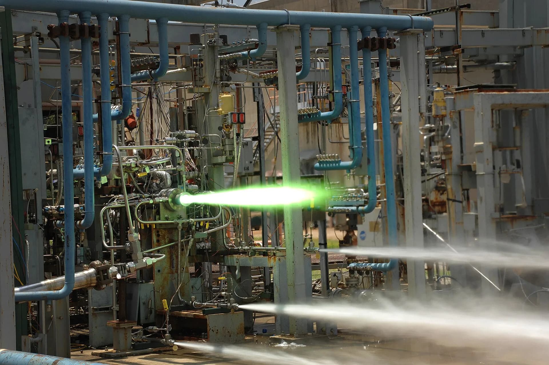 A rocket engine being test-fired in a test stand