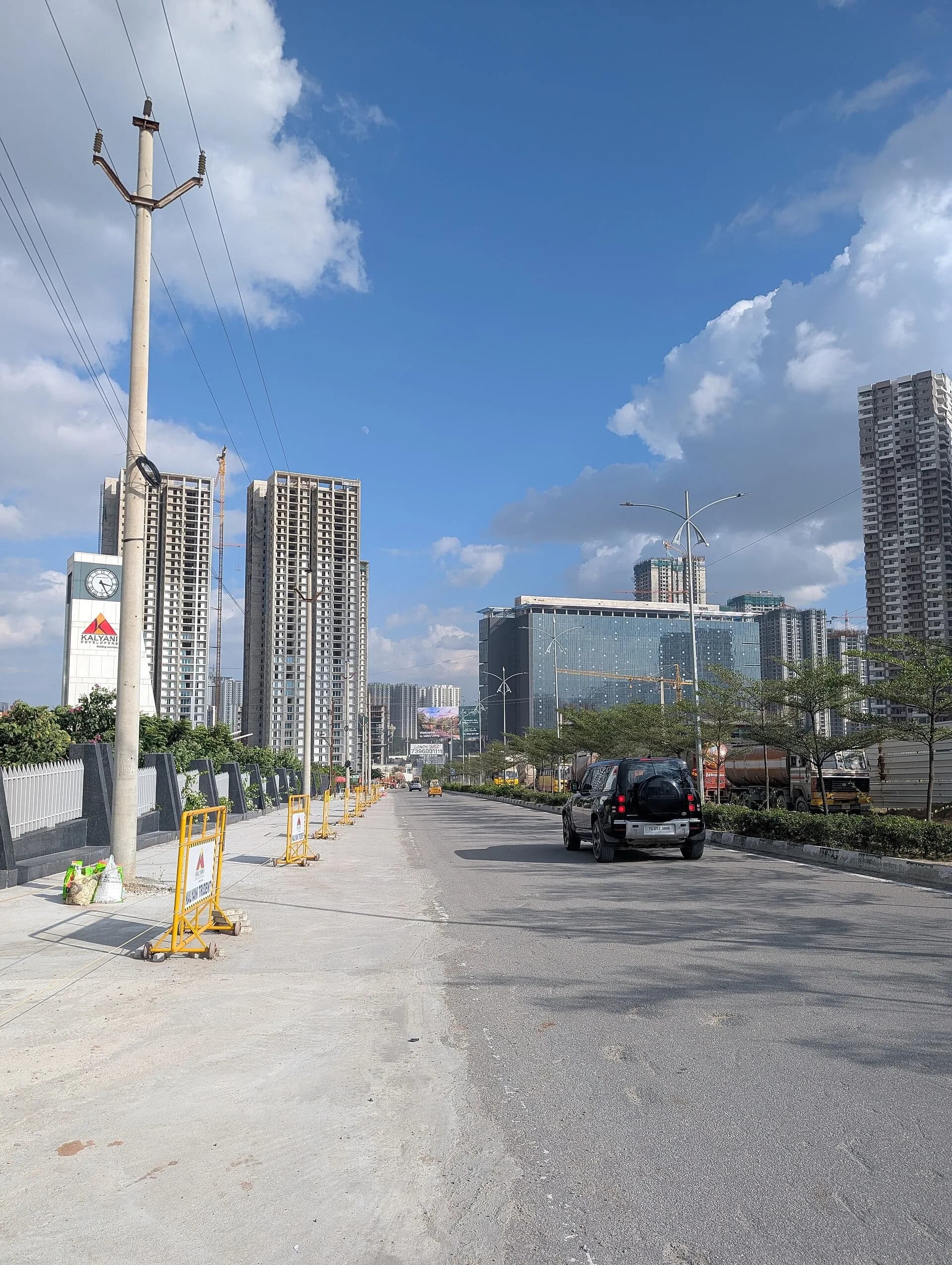 A street lined with modern buildings in Hyderabad