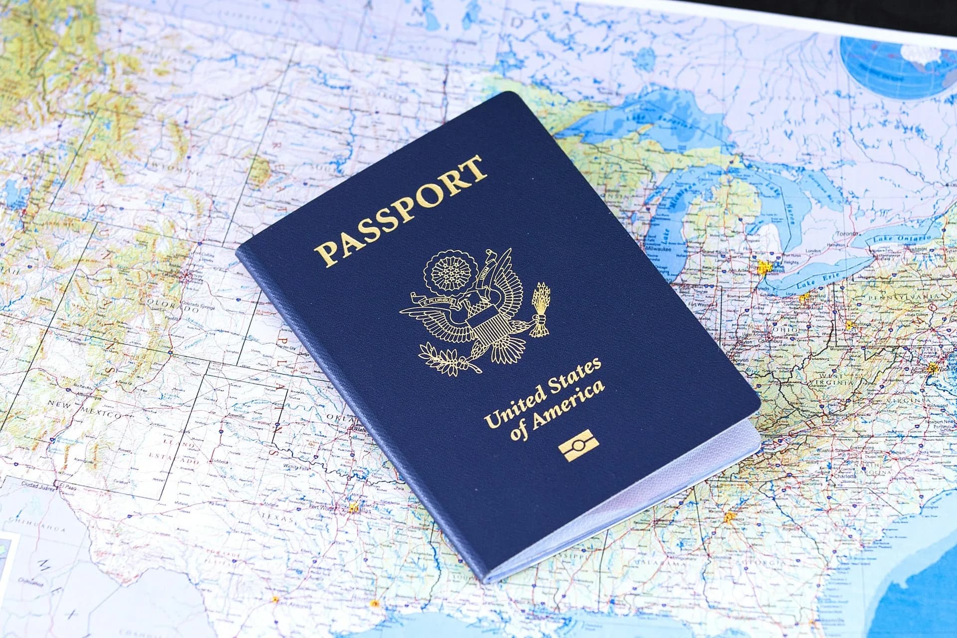 A passport lying on a map
