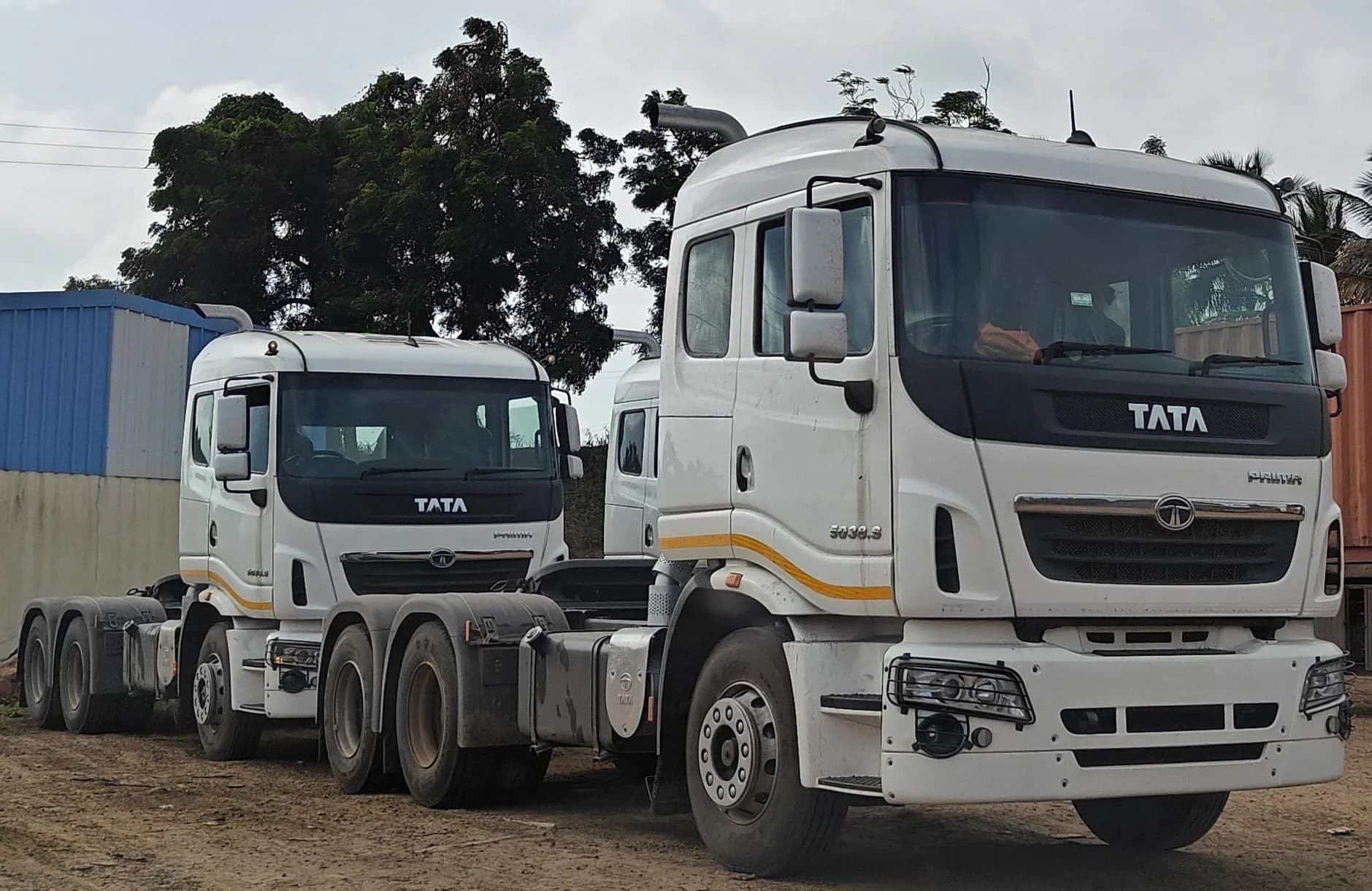 A white Tata Prima heavy truck